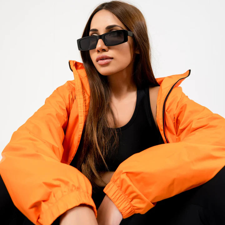 Lightweight orange windbreaker for active wear in USA