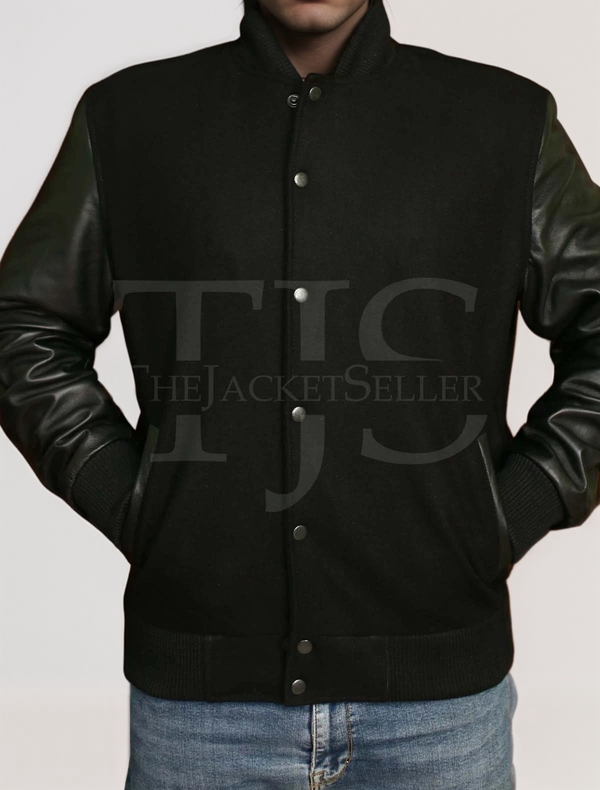 Black varsity jacket with sleek design and snap buttons