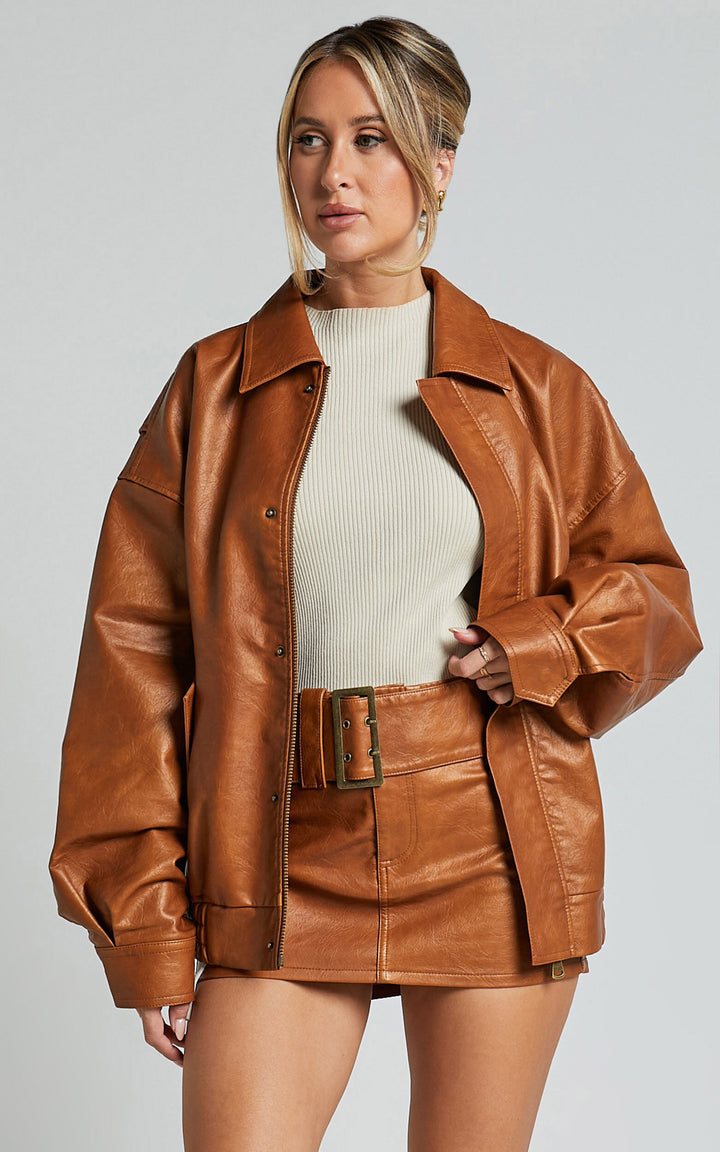 Women's tan bomber jacket with front zip and pockets in USA