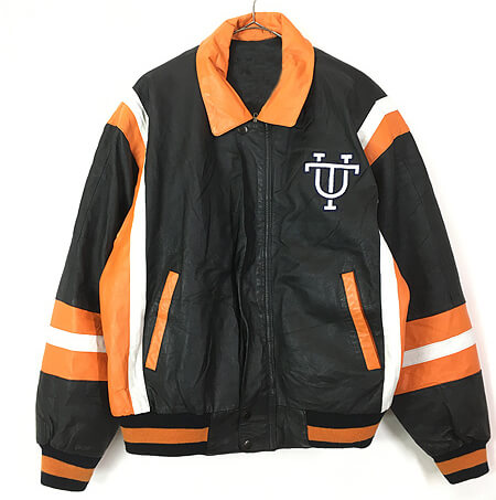 Leather jacket featuring Tennessee Volunteers college football branding and classic collegiate style