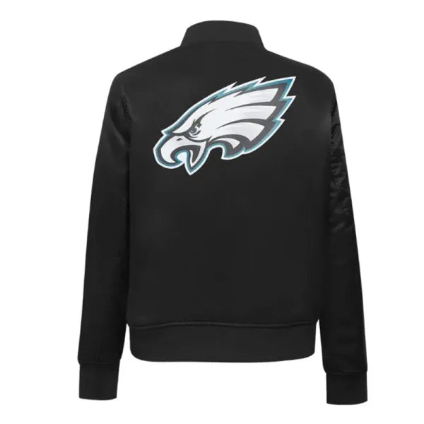 Black jacket with a sports team logo on the back against a white background