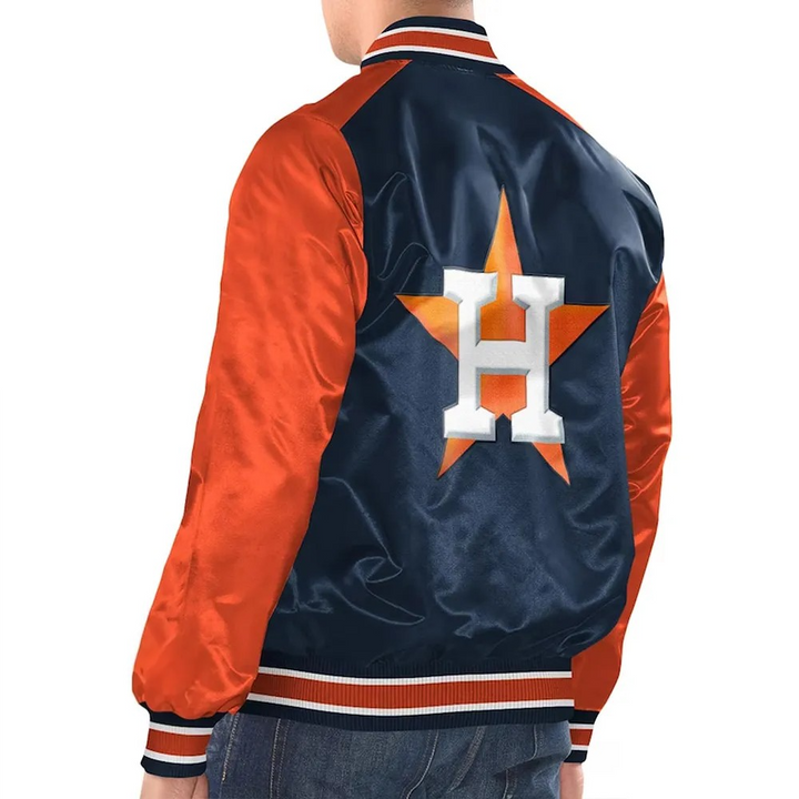 Navy and orange sports jacket with a large 'H' logo on the back, worn by a person.