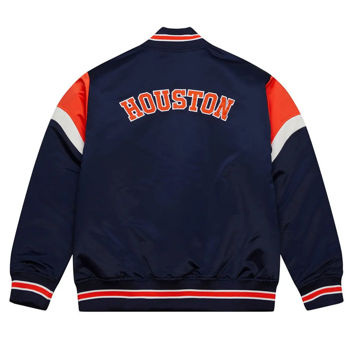 Navy blue jacket with 'HOUSTON' text on the back, featuring red and white accents.