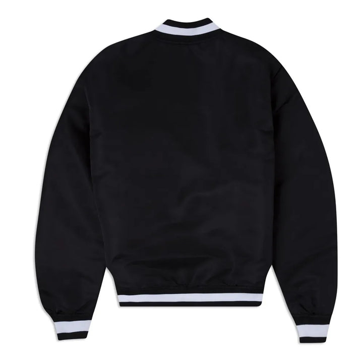 Black jacket with white trim on a white background