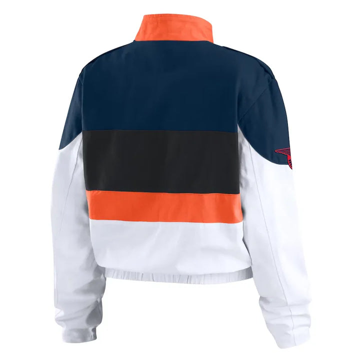 Color-blocked jacket with navy, orange, black, and white sections on a white background in USA