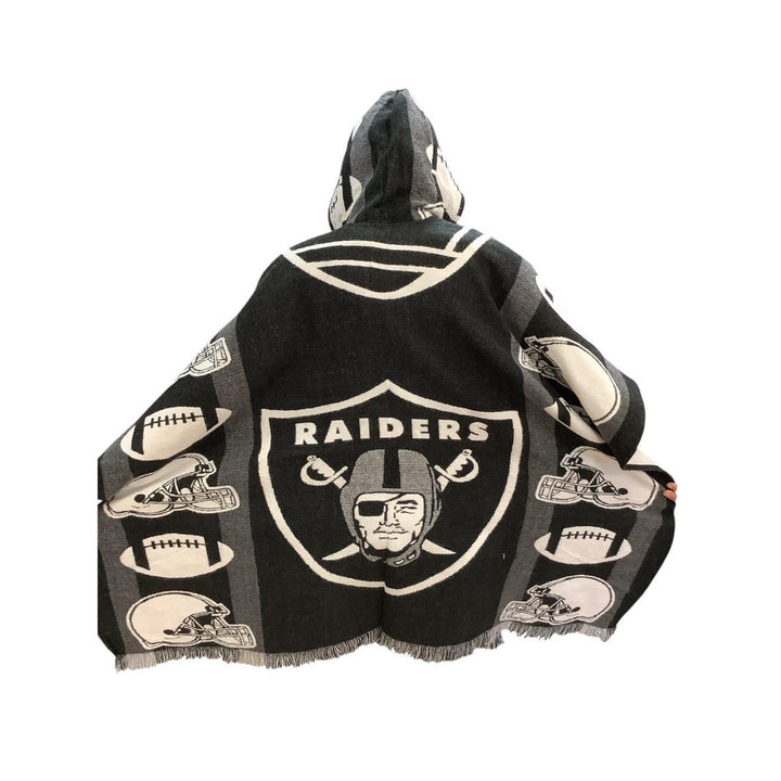 Black and white hooded blanket with Raiders logo and graphics on a white background