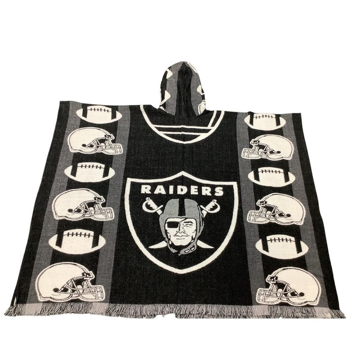 Oakland Raiders hooded towel with logo and helmet patterns on a black background