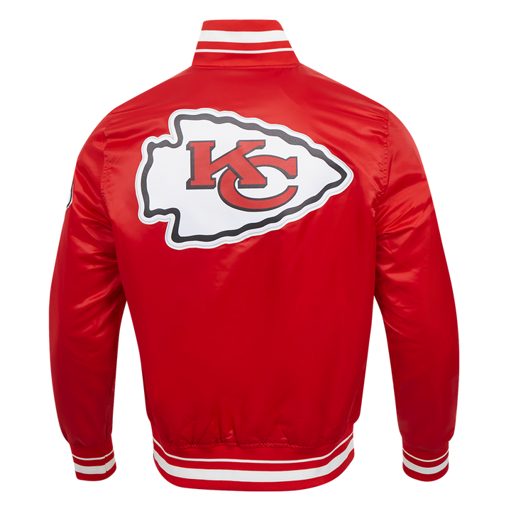 Kansas City Chiefs logo on the back of the red jacket.
