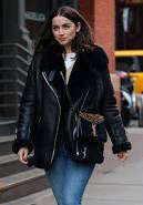 Sleek leather jacket with fur details for a trendy appearance in American style