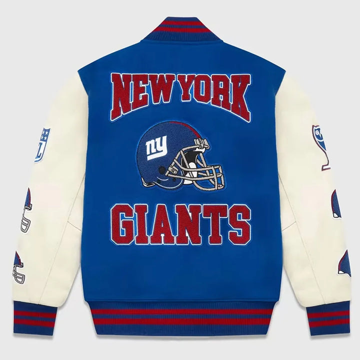 Blue and white letterman jacket with 'New York Giants' text and logo on a light gray background in USA