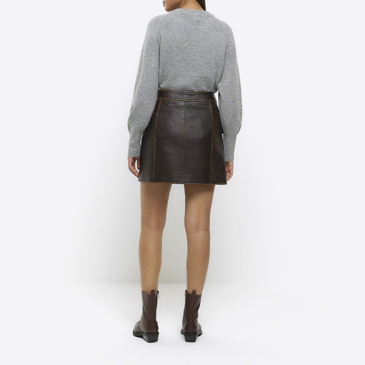 River Island distressed faux leather skirt close-up in France style