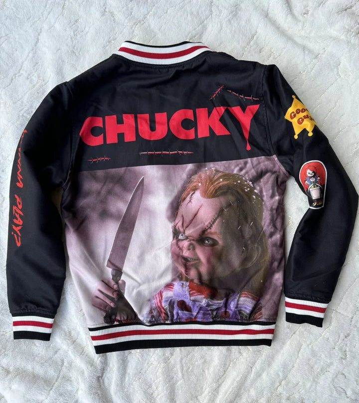 Black jacket with 'CHUCKY' and a graphic of a character holding a knife on a textured white background
