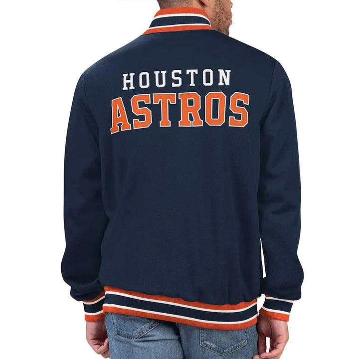 Navy blue jacket with 'Houston Astros' text on the back, worn by a person.