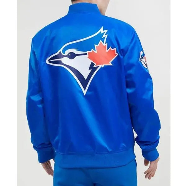 Blue sports jacket with a logo on the back against a white background
