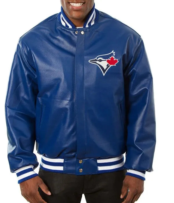 Person wearing a blue leather jacket with a logo on a white background
