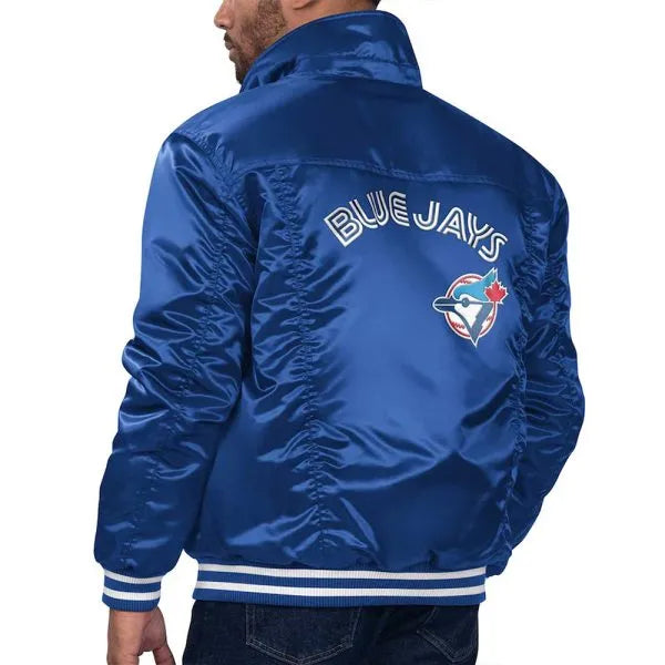 Blue jacket with 'Blue Jays' logo on the back, worn by a person in USA