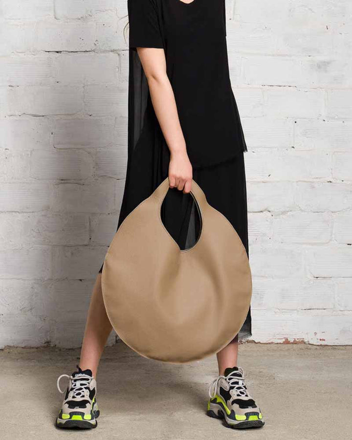 Chic and Elegant Leather Handbag with Circular Design in UK